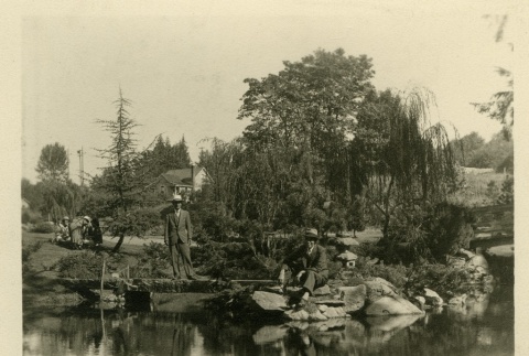 Issei men visiting a Japanese garden (ddr-densho-182-134)