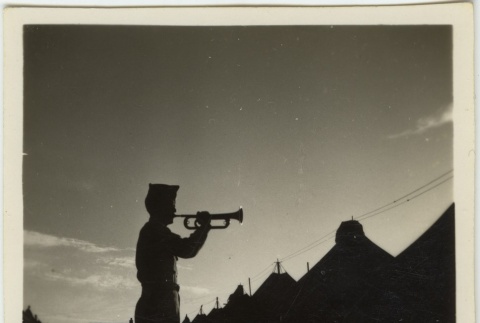 Silhouette of a soldier blowing a trumpet (ddr-densho-201-135)