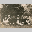Outdoor group photo of eleven individuals (ddr-densho-348-87)