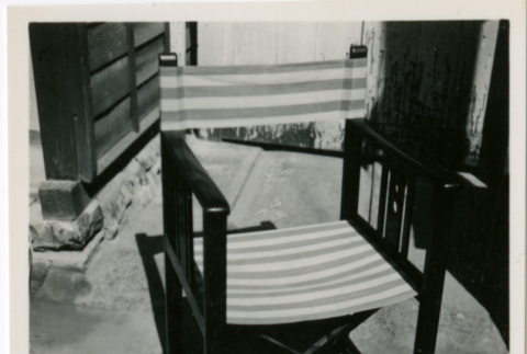 Wood chair with canvas back and seat (ddr-densho-426-924)