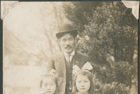 A man with two girls (ddr-densho-321-916)