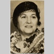 A woman wearing leis (ddr-njpa-1-1372)