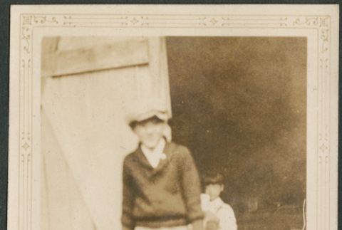 Man outside barn door (ddr-densho-316-291)