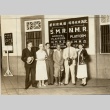 A group posing in a train station (ddr-njpa-1-1552)