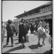 Japanese Americans arriving at Tanforan (ddr-densho-151-159)