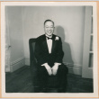 Unidentified man, seated and smiling (ddr-densho-410-542)