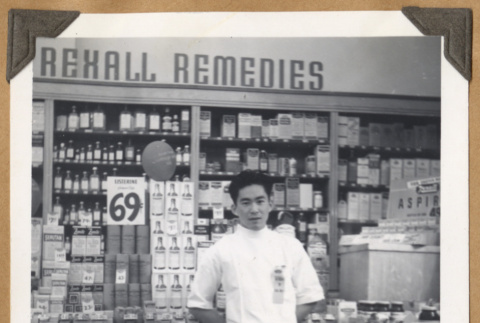 Gary Kikawa at The Owl Drug Co. (ddr-densho-542-110)