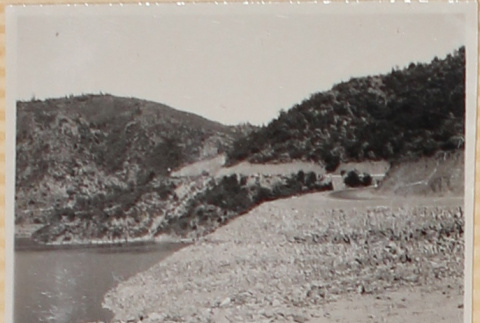 Shadow of two women on shore of lake (ddr-densho-522-10)