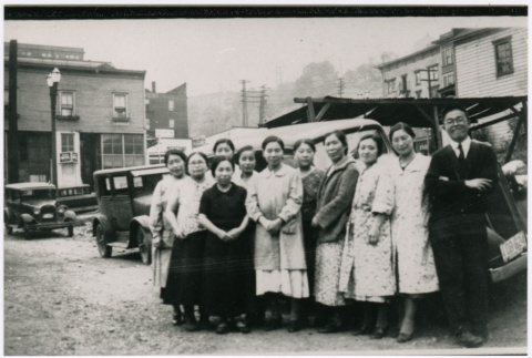 Taihoku Nippo employees in front of a car (ddr-densho-353-331)