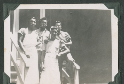 Five people standing by stairs (ddr-densho-471-97)