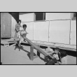 Children playing on a seesaw (ddr-densho-37-603)