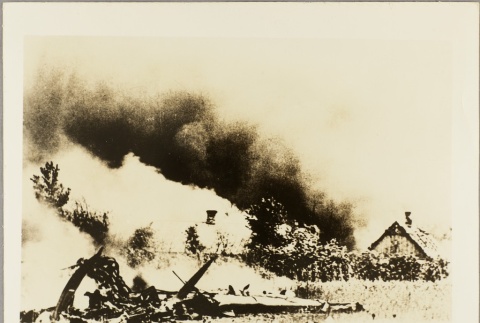 Smoke rising from a downed aircraft (ddr-njpa-13-441)
