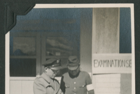 Soldiers in front of repatriation center (ddr-densho-397-369)