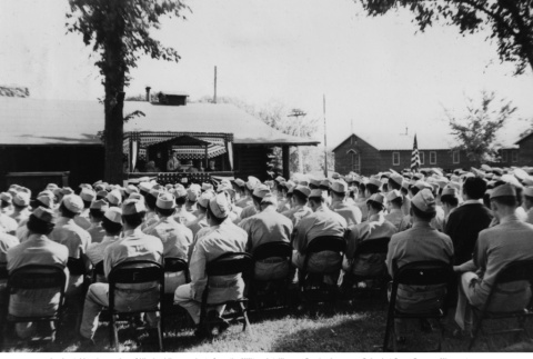 Audience of men in uniform facing speaker at podium (ddr-ajah-2-814)