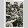 Soldiers sitting on park bench (ddr-densho-368-208)