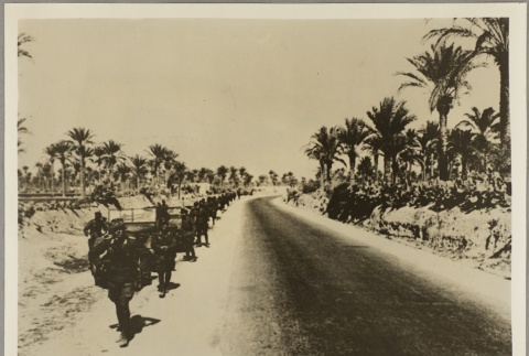Soldiers marching along a road (ddr-njpa-13-1677)