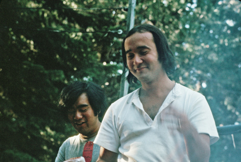 Ted Hasegawa and Rev. Mike Angevine grilling burgers (ddr-densho-336-1218)