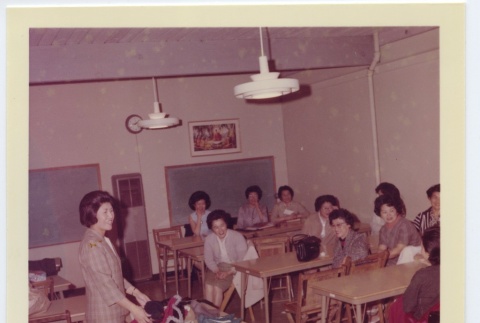 Women's auxiliary group having a class (ddr-jamsj-1-596)