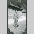 Man standing by barracks (ddr-ajah-2-342)
