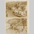 Men and women traversing flooded streets in boats and rafts (ddr-njpa-6-39)