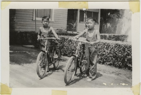 Two boys on bicycles (ddr-densho-242-8)