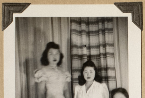 Four women in formal dresses (ddr-densho-542-428)