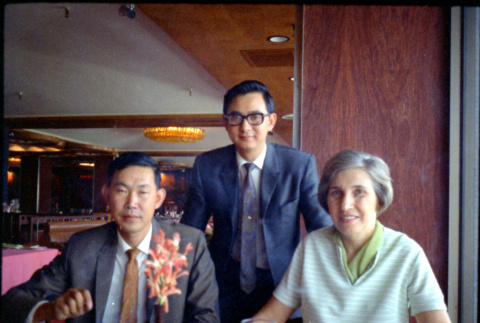 Two men and a woman in restaurant (ddr-densho-426-763)