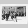 Group of men in uniform outside building (ddr-densho-434-478)