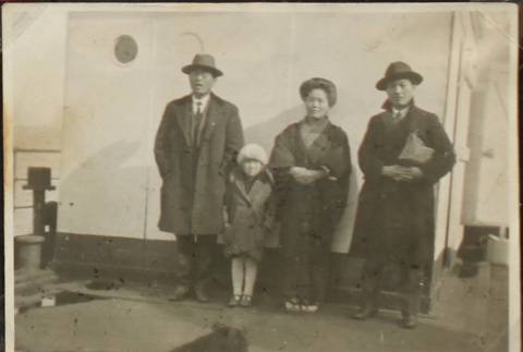 Japanese family on a ship to America (ddr-densho-259-122)