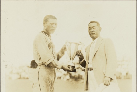 Man receiving a baseball award (ddr-njpa-5-520)
