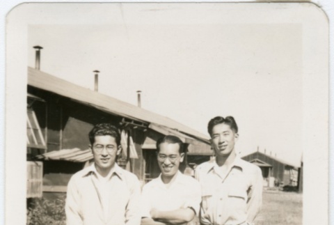 Three men in front of barracks (ddr-densho-298-2)