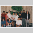 Staff photo in front of potted plant (ddr-densho-506-68)