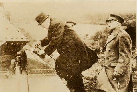 Winston Churchill climbing into a tank (ddr-njpa-1-82)