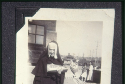 Nun holding papers (ddr-densho-330-156)
