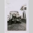 Boys pose on car bumper (ddr-densho-359-1600)