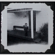 Boy poses on porch (ddr-densho-359-1548)