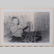 Peter playing with toy helicopter (ddr-densho-462-267)