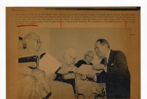 Attorney General Dick Thornburgh presents three elderly Japanese-Americans with redress checks (ddr-csujad-52-15)