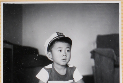 William Shiomi sitting on floor (ddr-densho-522-253)