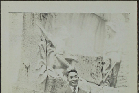 A man standing next to a fountain (ddr-densho-328-568)