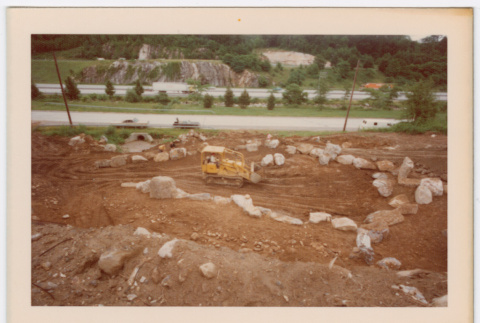 Rock waterfall and pond under construction (ddr-densho-377-2196)