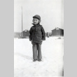 Lester Ichiro Hashiguchi standing in snow at Minidoka (ddr-densho-474-203)