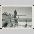 Man getting into an Air Force plane (ddr-densho-321-320)