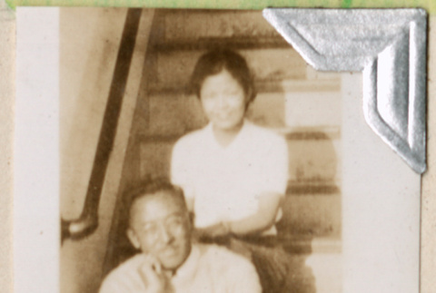 Man and woman sitting on steps (ddr-densho-383-89)