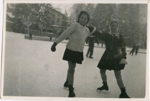 Two girls ice skating (ddr-densho-201-426)