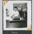 Man sitting at desk working (ddr-densho-434-247)