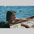 Naomi Takagi log rolling in the lake (ddr-densho-336-1133)