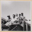 Hardy Shiomi with three boys and wagon driver on covered wagon (ddr-densho-522-318)
