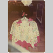 Photo of table setting with flowered tablecloth (ddr-densho-424-851)
