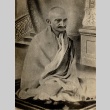 Gandhi seated wearing a prayer shawl (ddr-njpa-1-449)